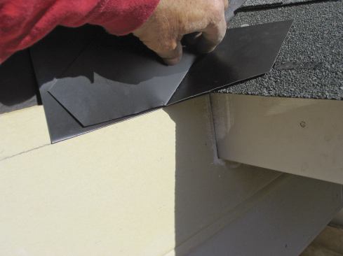 following the line marking the bottom of the next piece of siding.