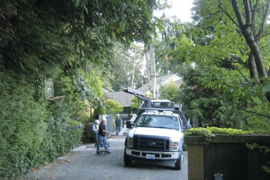 Our first logistical challenge was simply getting the beams into the basement, using our boom truck, some furniture dollies, and a pair of one-ton Genie lifts. A few days before the I-beams showed up, we did a test run with a full-length wood mockup to make sure we could get them where they needed to go.