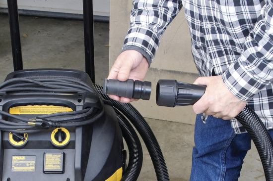 A special fitting on the end of the hose allows it to clamp onto the dust ports of newer DeWalt tools and — through the use of adapters — onto older models and other brands. 