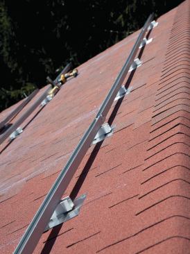 Where required, rail sections are joined between mounting feet with splice fittings that allow for necessary thermal expansion and contraction. The fittings add enough flexibility to allow the rails to conform to minor irregularities in the roof plane.