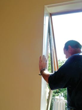 Then, collapsing the frame into the opening.