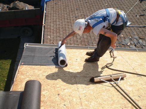 A rope grab is needed to match the length of the safety line to job-site conditions. The mechanical rope grab in this top photo must be manually operated.