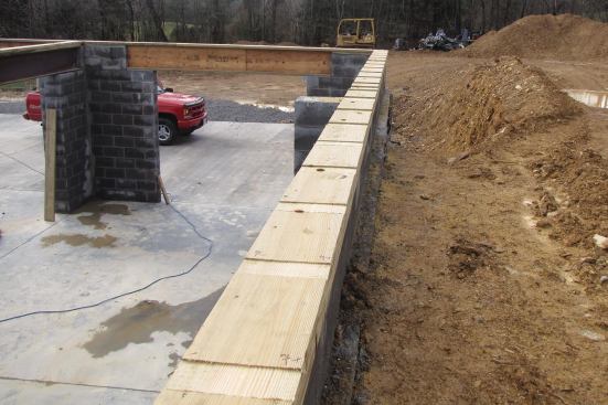 We notched the sills using a Porter-Cable fixed-base router equipped with a Bosch 3/4-inch double-flute straight router bit.