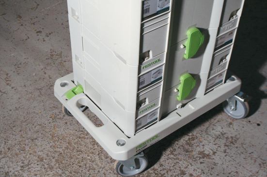 The SysCart resembles a mover's dolly and has clips to hold a Systainer on top.