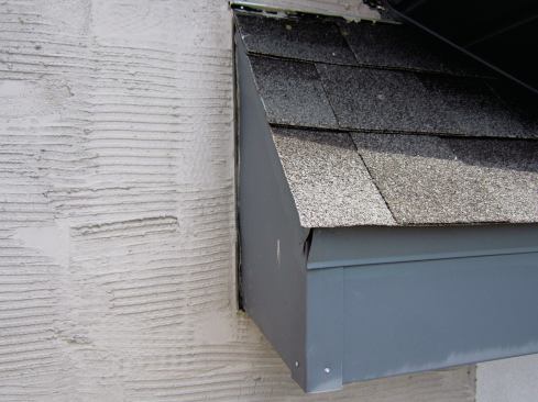 A rake return, like the ones on the gable ends of this house, is a different animal. Here we have a vertical joint that will see its fair share of wind and rain.