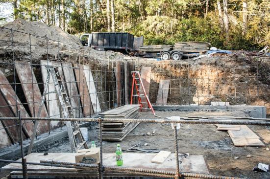 Reinforcement schedules for tall walls typically call for horizontal rebar on 12-inch to 18-inch centers depending on site conditions and structural requirements.