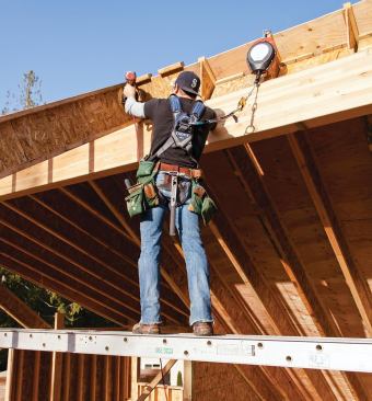 A self-retracting lifeline eliminates the need for a rope grab but tends to tug on the harness, making it most suitable for work done very near the anchor point.
