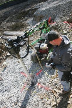 Hydraulically driven helical piles
(photo above) are typically
installed by subcontractors who use torque readings to achieve the required
bearing capacity in a variety of soils. (For more information, see Working with
Helical Piles)