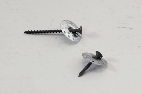 When used with drywall screws, these thin, perforated discs (Charles Street Supply Co., 800/382-4360, charlesstreetsupply.com) flatten under pressure, which draws the plaster tight to the substrate without causing new cracks.