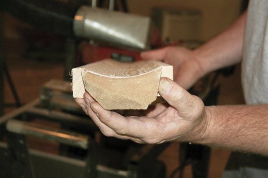 Sending each piece through the molder twice helped to avoid chattering while hogging out the 1/2-inch-deep cut for the fluted profile.