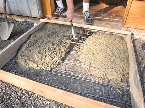 Steel mesh needs to be pulled up when the concrete is placed so it ends up in the center of the slab.