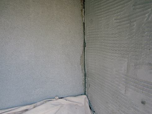 Nothing special has to happen where stone wraps around an inside wall corner. It is the same materials on each face of the wall, and there's no reason for them to move at dissimilar rates. But on the inside corner,one wall will get stone and the other has EIFS.