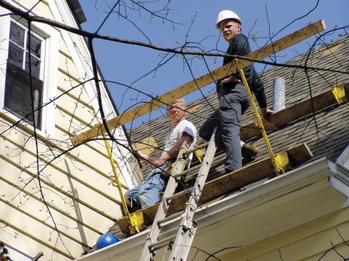 Roof jacks fitted with integral guardrails can be used instead of safety harnesses in certain situations, such as for flashing and repair work.