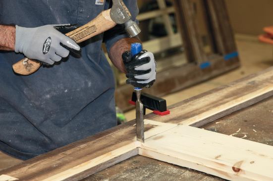 The panels fit into 1/2-inch by 1/2-inch rabbets routed in the frames.