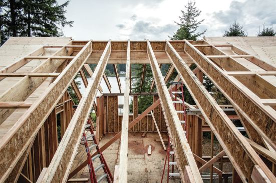 Or, we may order LVL for the gable rafters, as we did on the shed-dormer area, and notch for the lookouts.