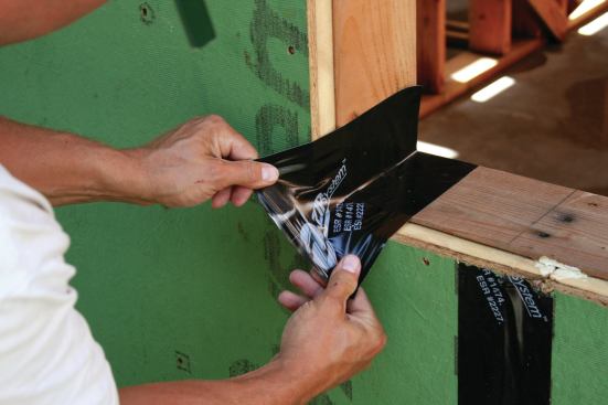 This left 2 inches overhanging the sheathing, which we stretched ...