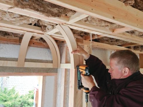 Pairs were butted together to form each corner and fastened in place with glue and staples.