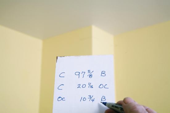 The author records measurements in a logical order as he works around the room.