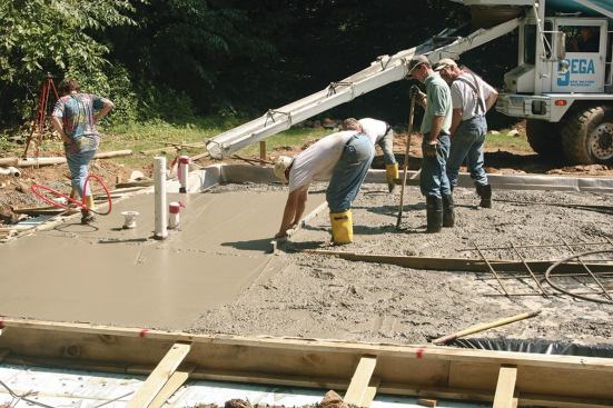The concrete work was no different than any other slab I’ve ever done — a sleepless night followed by a hard day’s work. I used 3,500-psi concrete with fiber. Because it was a hot day, I ordered the concrete with retarder so there’d be more time to finish it.
