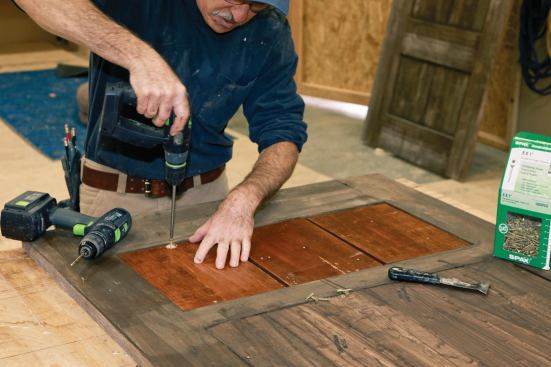 The upper panels were made of Douglas fir, which the author stained before installation.