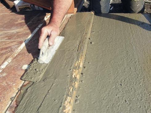 A magnesium float is used where a bull float is too large.