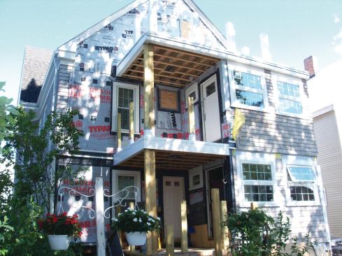 Using a membrane on all three decks ensures that water from rain or snowmelt will drain away from the house. On the ground-floor deck, the membrane keeps water away from the foundation, protects the underlying framing and connections, and allows for dry storage underneath.