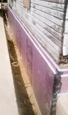 Most foundations in the DER houses needed waterproofing anyway, creating an opportunity to add foam to all of the foundation exteriors. Most received a double layer of rigid foam.