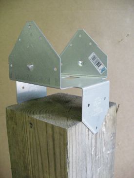 Connectors should be properly sized to match the framing. The Simpson Strong-Tie BCS2-3/6 is a one-piece connector for attaching a triple 2-by beam to a 6x6 post.