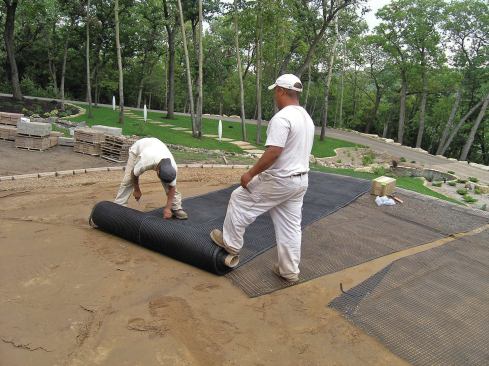 Synthetic geogrid is used when retaining walls are built on soils containing a lot of silt or clay, or when wall heights exceed 4 feet.