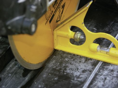 SQUARE THE BLADE 

Set the head of a combination square on the saw table and adjust the blade so that it is perfectly plumb to the table (1). Because this saw has a tilt-angle feature, I check the 45-degree setting (2). This tool also has a 221/2-degree setting, but 

I seldom check it because I rarely need to make cuts at that angle. 

