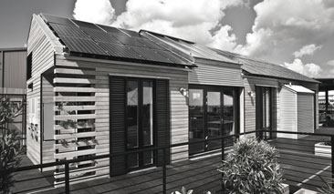 Movable steel shutters provide both shade and high-wind protection.