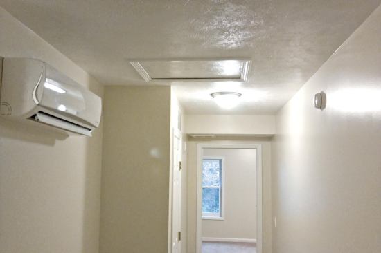In the most efficient DER homes, wall-mounted mini-splits were used in the first- and second-floor hallways. Bath fans were installed nearby to pull conditioned air from the hallways into the bedrooms, but comfort issues led to relocation of air outlets from the continuously running ERV.