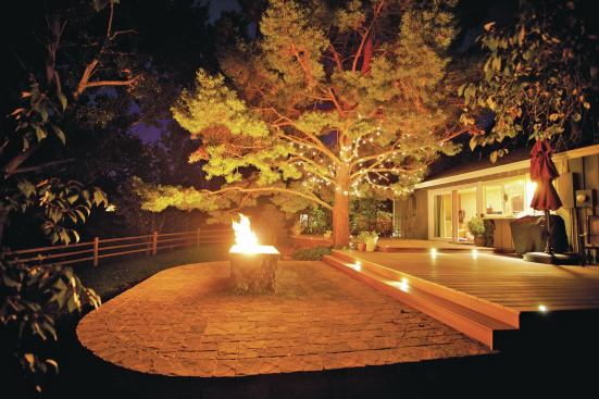 The gas fire feature contains a custom-made stainless steel pan for a brighter flame.