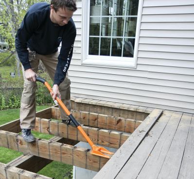 The Gutster provides excellent leverage for prying apart framing and removing the first couple of deck boards.