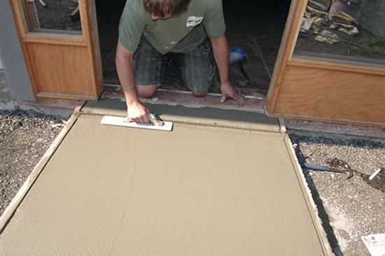 Once the concrete loses the shine from the bleed water, it’s bull-floated or magged again.