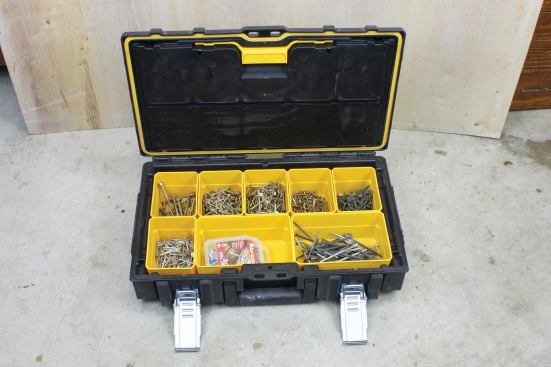 The system includes three boxes of varying depth, an organizer box with removable part bins, and a wheeled "DS Carrier" for transport.