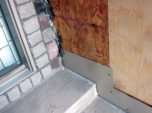 At the exterior steps on the house, we had to install aluminum flashing first to bridge over the sheathing transition.