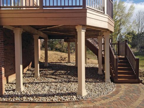 The author’s “triple stacked” fascia extends just below the bottom of the support beam, concealing all the horizontal framing. 