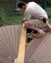 Figure 11. Another jig aligns the wedges radially. Cut to mirror the angle of the wedges, this second jig revolves on the center point.