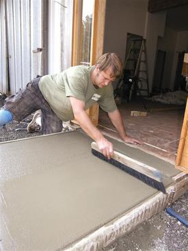 A slab may be finished with a broom to provide traction.