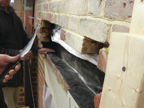 Most of the time, however, we just have the masons bring the flexible through-wall flashing all the way out to the face of the brick.