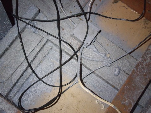 This intersection of a rake wall, partition walls, and nailing plates took less than two minutes to seal. In complex geometrical areas like this, it is difficult to evaluate just where the leak is. Sometimes these areas are partially done at best, but more often, they are ignored completely.