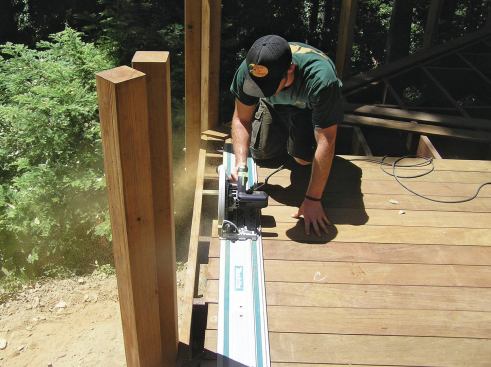 The Festool TS 75 EQ has a 2 3/4-inch cutting capacity; here it is being used to trim decking so that the deck can be picture-framed.