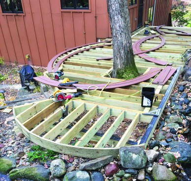 Where the curved edge would receive fascia trim, the author built up the rim joist with three layers of 1/2-inch PT plywood ripped to width.