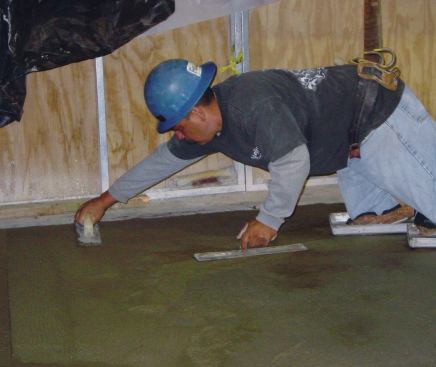 When hand-finishing, it is common practice for experienced finishers to float (right hand) and then trowel (left hand) with a large trowel before moving the kneeboards.