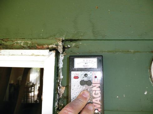 When the roof sheathing becomes saturated, water enters the wall system via the top plates. Here the siding and window trim have a sky-high moisture content.