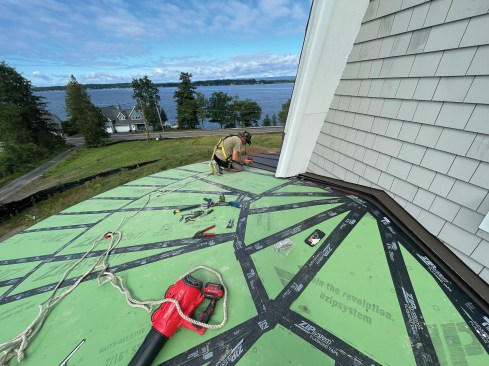 As well as fabricating the kickout flashings where the porch roof meets the wall and the wall flashings installed before siding.