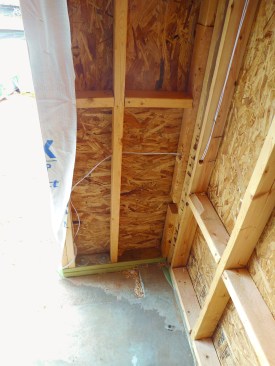 Locating anchor bolts away from the ends of the wall weakens the wall base’s resistance to overturning forces.