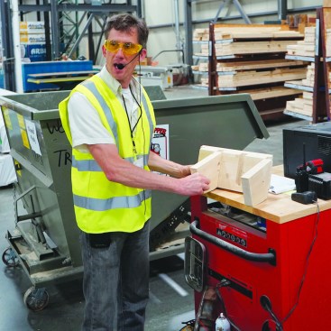 Mortise-and-tenon joinery substitutes for steel connectors in some situations; here, Hans Porschitz demonstrates a mortised porch-roof connection.