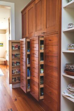 Roll-out shelves put essential items within easy reach.